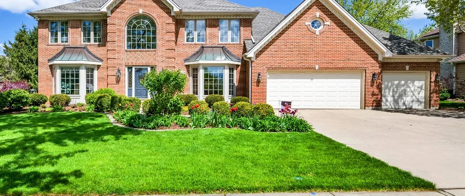 Residential property with nice lawn and landscaping in Austin, TX.