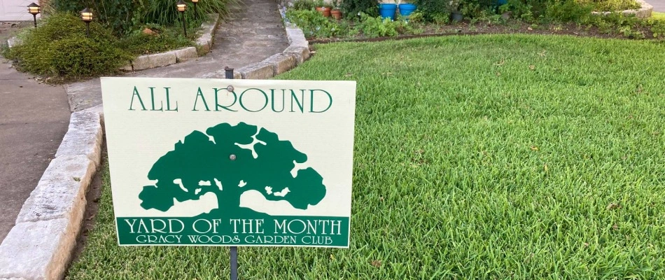 Signage of Yard of the Month placed in client's lawn in Austin, TX.