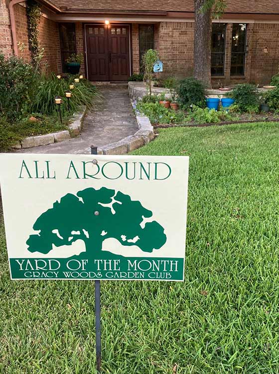 Yard of the Year sign in a lawn near Austin, TX.
